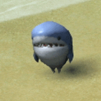 a cartoon shark with a blue head is standing on a beach