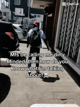 a man walking down a sidewalk with a caption that says mfs be calling me dirty