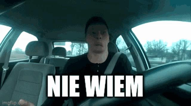 a man in a car says nie wiem