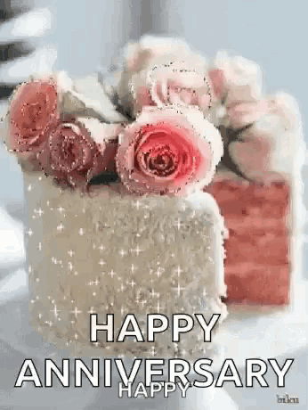 a happy anniversary greeting card with a cake and roses .