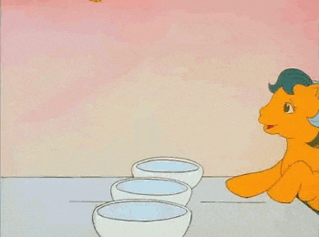 a cartoon of a pony sitting at a table with a bowl of food .