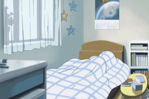 a bedroom with a calendar on the wall and a bed