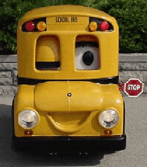 a yellow school bus with a stop sign on the side of it