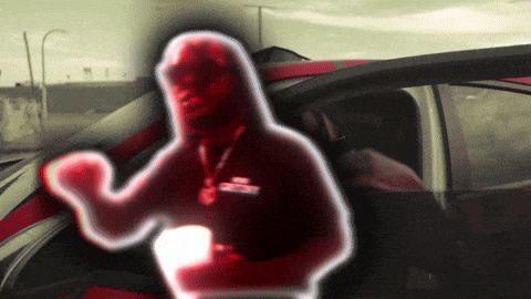 a man in a hoodie with a name tag that says ' chevrolet ' on it