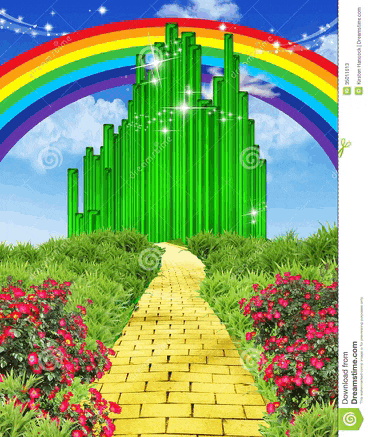 a yellow brick walkway leading to the green wizard of oz castle with a rainbow in the background .