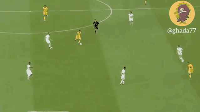 a group of soccer players on a field with the hashtag @ ghada77 on the bottom