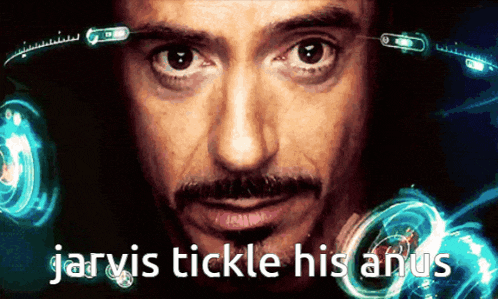 a close up of a man 's face with the words jarvis tickle his anus