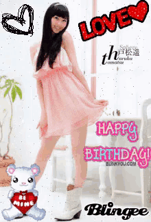 a girl in a pink dress is standing next to a teddy bear with a heart on it and says happy birthday