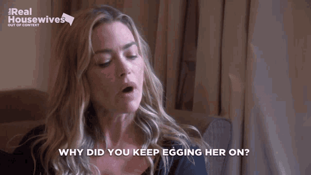 a woman says why did you keep egging her on while sitting on a couch