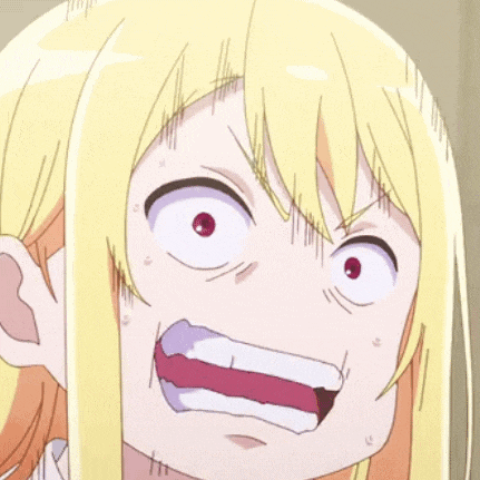 a close up of a cartoon girl with blonde hair making a funny face .