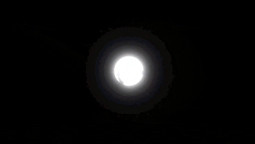 a black background with a white triangle in the center