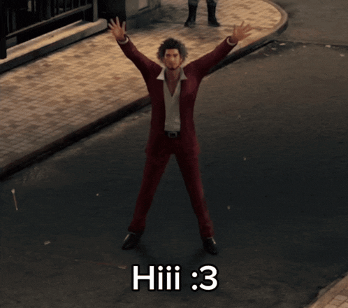 a man in a red suit is standing on a street with his arms outstretched and the words hiii : 3 below him