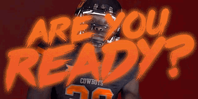 a football player with the number 30 on his jersey stands in front of an orange sign that says " are you ready "