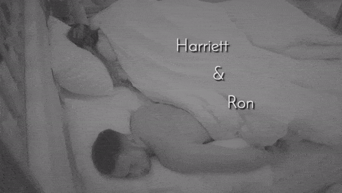 a shirtless man is laying in bed with the name ronnie written above him