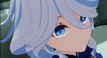a close up of a person 's face with blue eyes