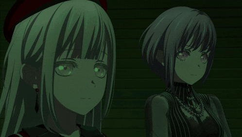 two anime girls are standing next to each other