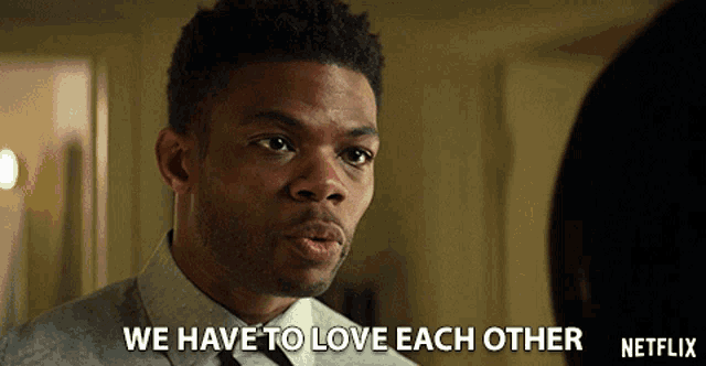 a man says we have to love each other in a netflix ad