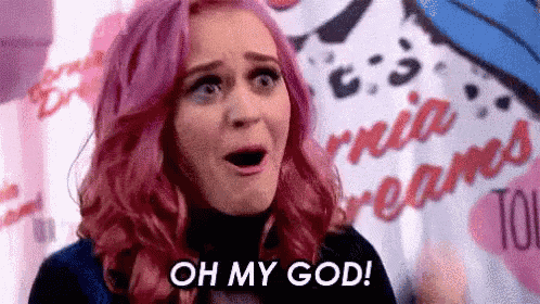 a woman with pink hair is saying `` oh my god '' .