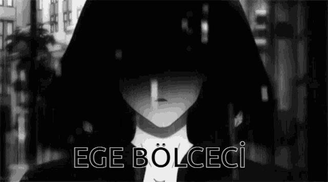 a black and white photo of a person with the words ege bolceci written above them