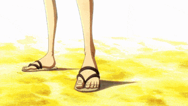 a person wearing flip flops is chained to a chain with the number 6 on it