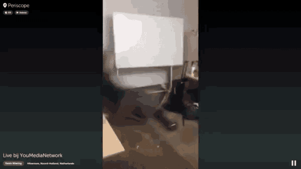 a video of a man standing in front of a white board is being displayed on periscope