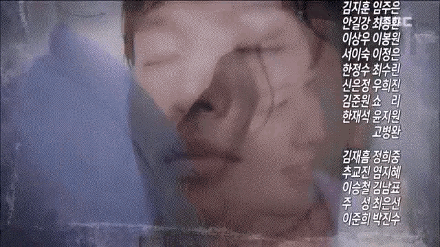 a close up of a person 's face with chinese writing on the bottom