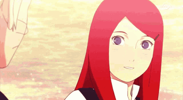 a girl with red hair and purple eyes is smiling in front of a man