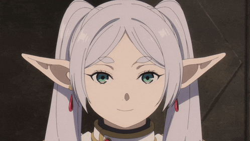 a girl with white hair and green eyes is smiling