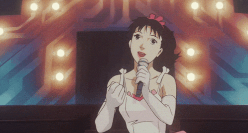 a cartoon girl singing into a microphone in front of a stage