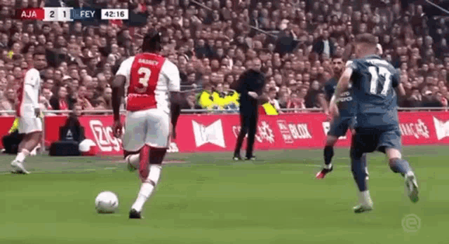 a soccer player with the number 3 on his back