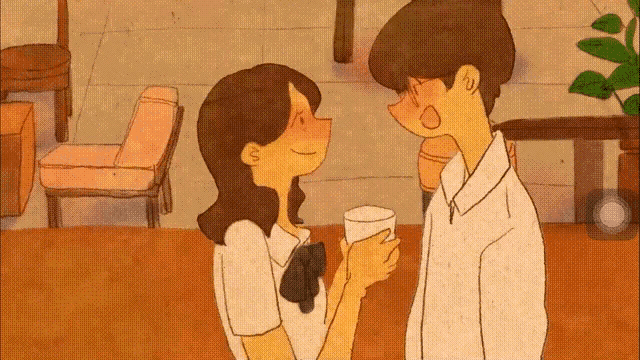 a boy and a girl are standing next to each other holding cups