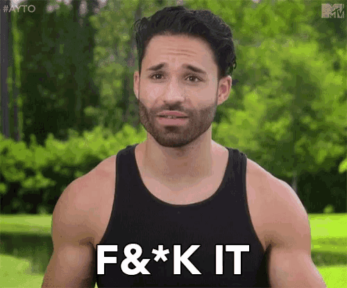 a man with a beard is wearing a black tank top and has the words f & * k it on his chest .