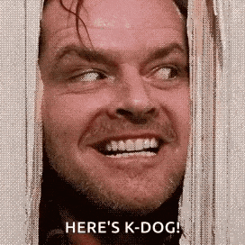 a close up of a man 's face with the words `` here 's k-dog '' written below it .