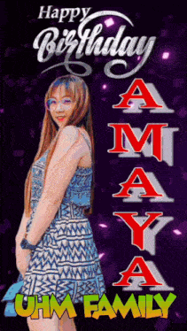 a woman in a blue and white dress is standing in front of a happy birthday sign