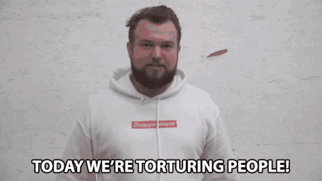 a man wearing a hoodie that says dixappo ment