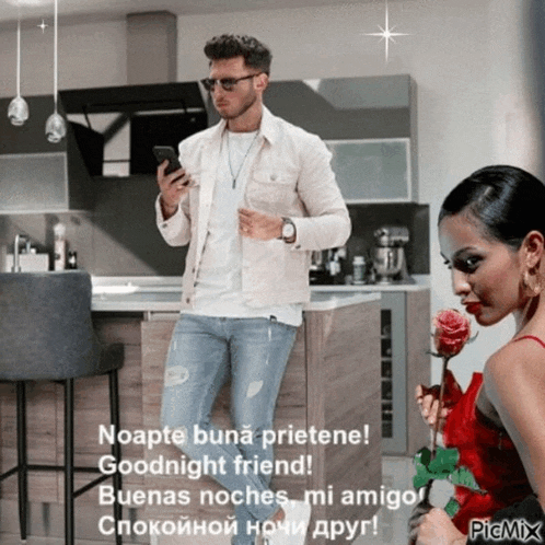 a man is looking at his phone while a woman holds a rose in front of him