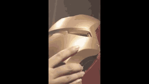 a close up of a person wearing a helmet with a mask on it