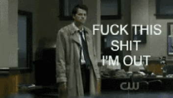 a man in a trench coat is standing in front of a sign that says fuck this shit i 'm out