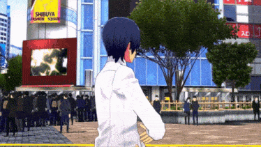 a man stands in front of a shibuya fashion square building