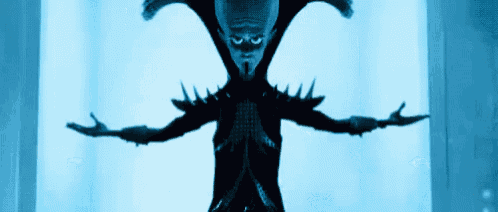 a cartoon character with spikes on his arms and a large head