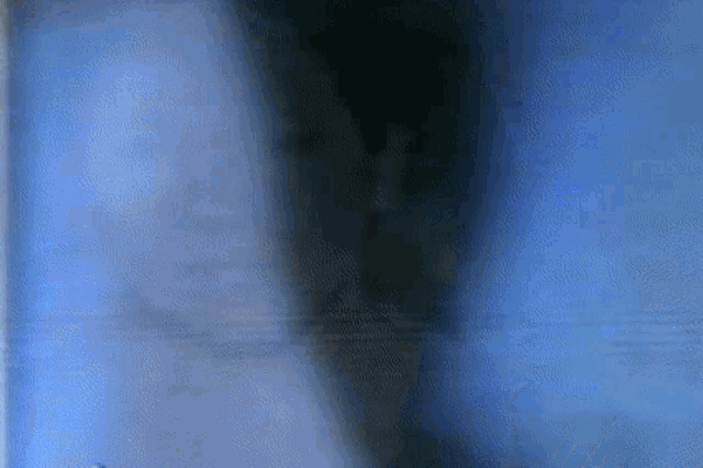 a blurry picture of a blue background with a few lines