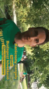 a man wearing a green shirt with the name karacsony gergely written on it