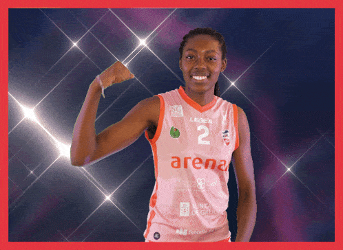 a female basketball player is wearing a jersey that says arena on it