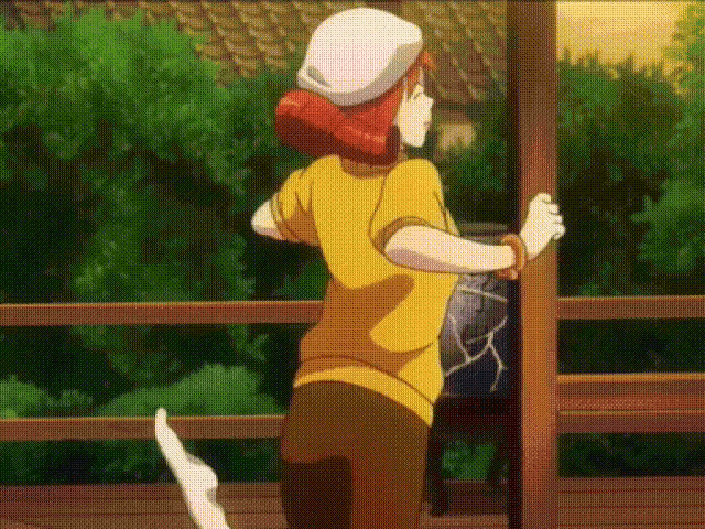 a girl with red hair and a yellow shirt is standing on a balcony