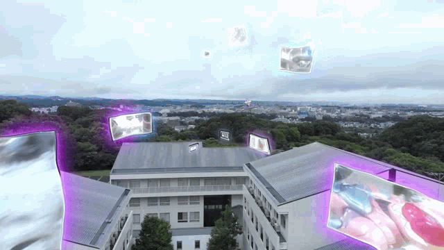 an aerial view of a large building with a purple glow around it