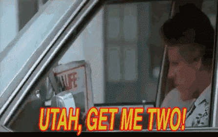 a man in a car says utah get me two .