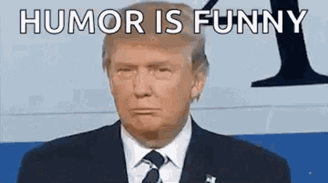 donald trump is wearing a suit and tie and making a face .
