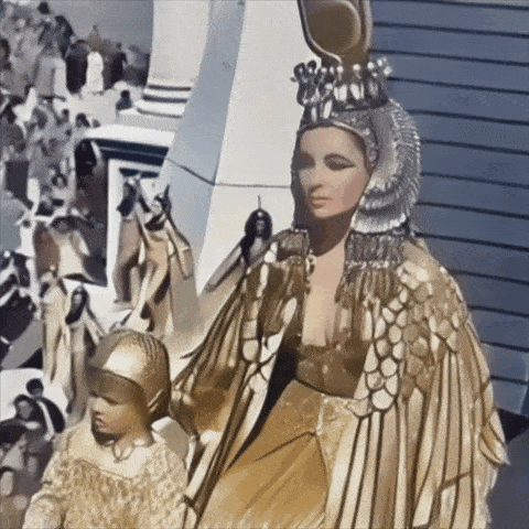 a painting of a woman in a gold dress holding a child