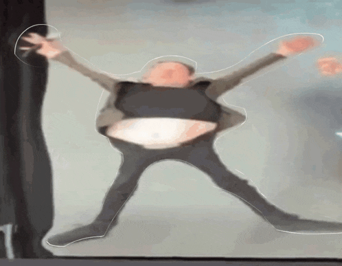 a blurry picture of a man with a huge belly