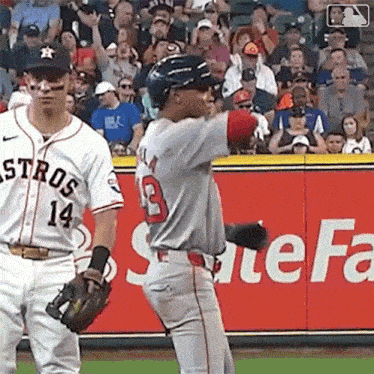 a baseball player with the number 3 on his back